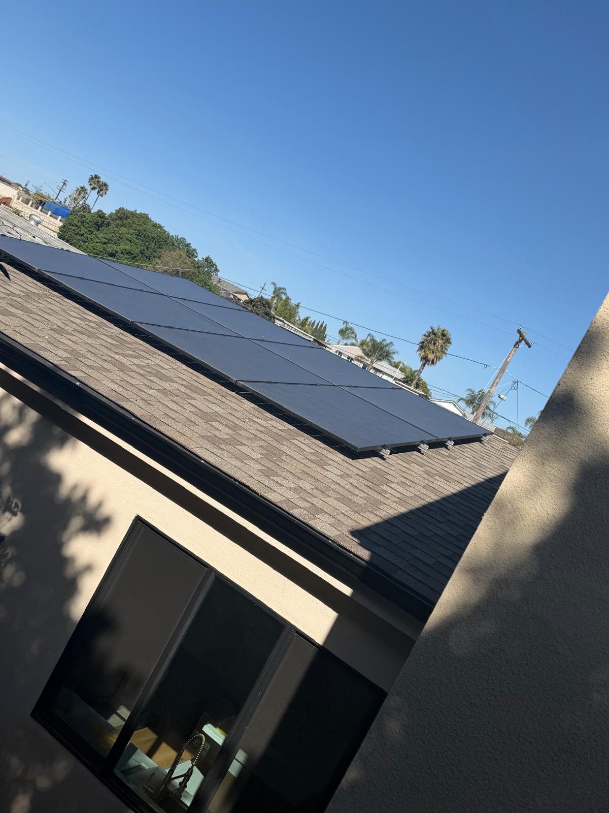 Rooftop solar panel installation on a San Diego home by Sky Source Electric